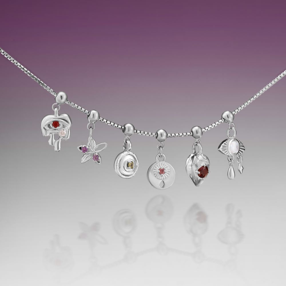 Veyora Charm - Eyeverse OfTheSun